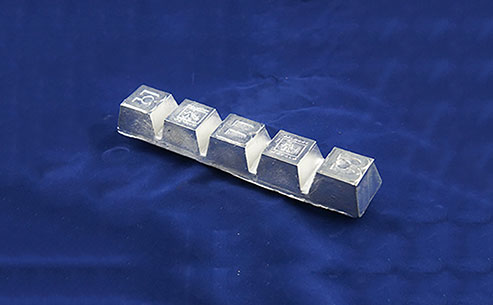 What is tin-based alloy material?